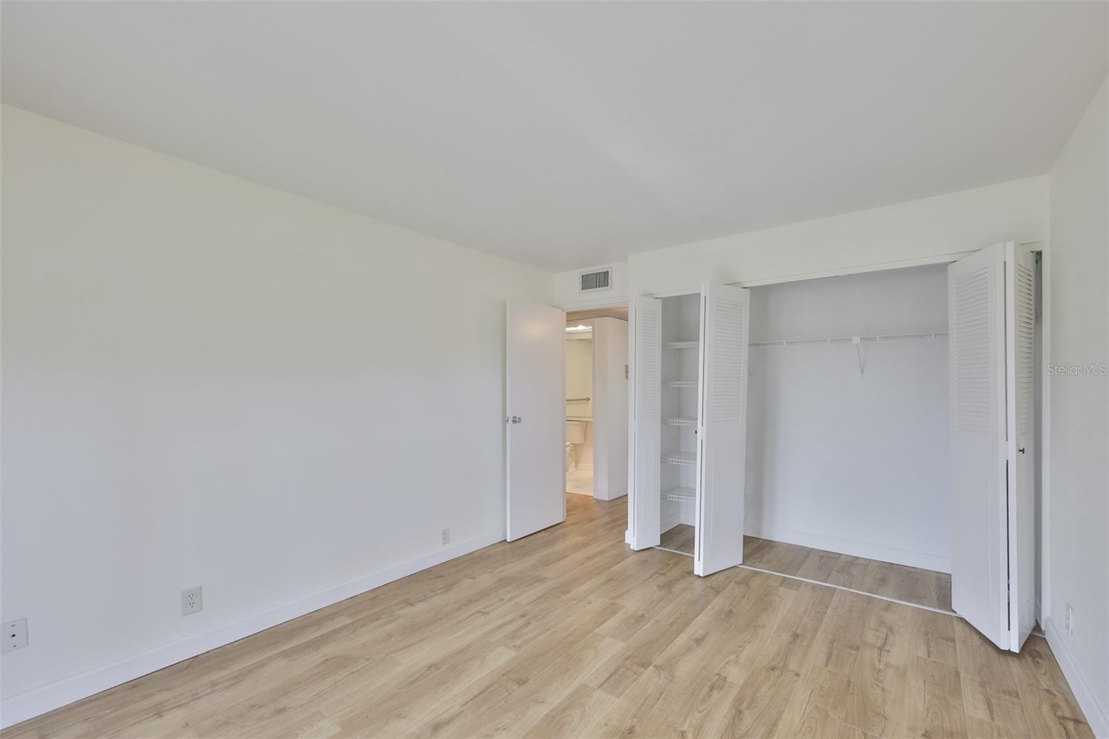 Bedroom 2 oversized closet, view to hallway