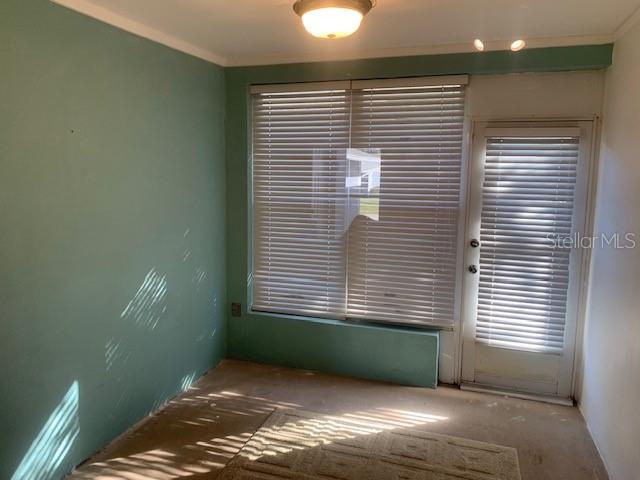 lanai with a grassy area in back