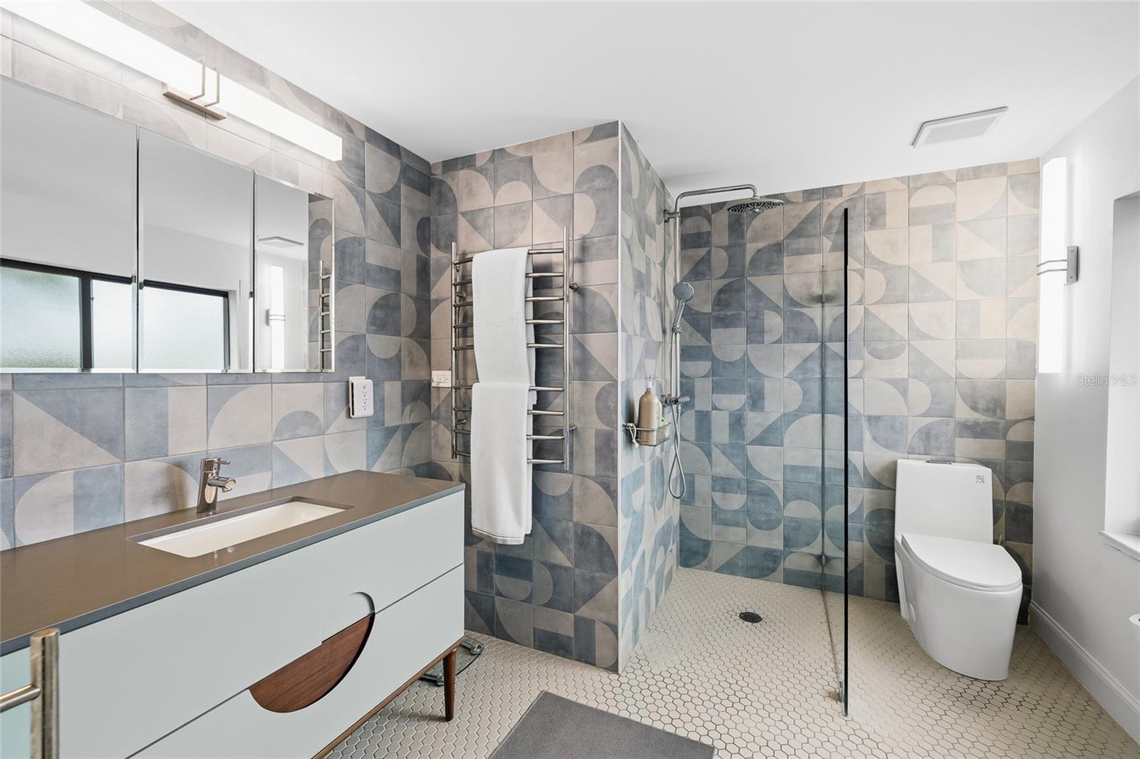 Luxury Towel Warmer and Curbless Shower