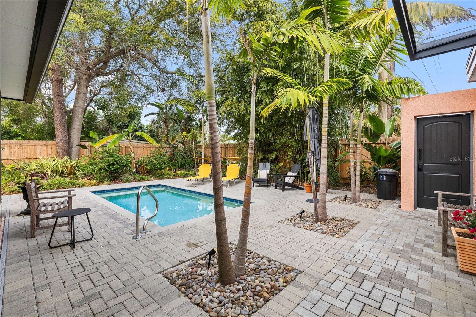 Fenced Backyard W/Lush Landscaping