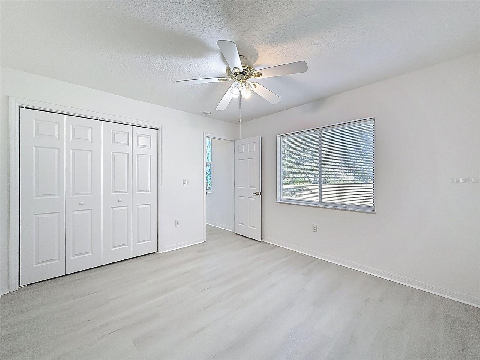 Guest suite bedroom with close by pool bathroom