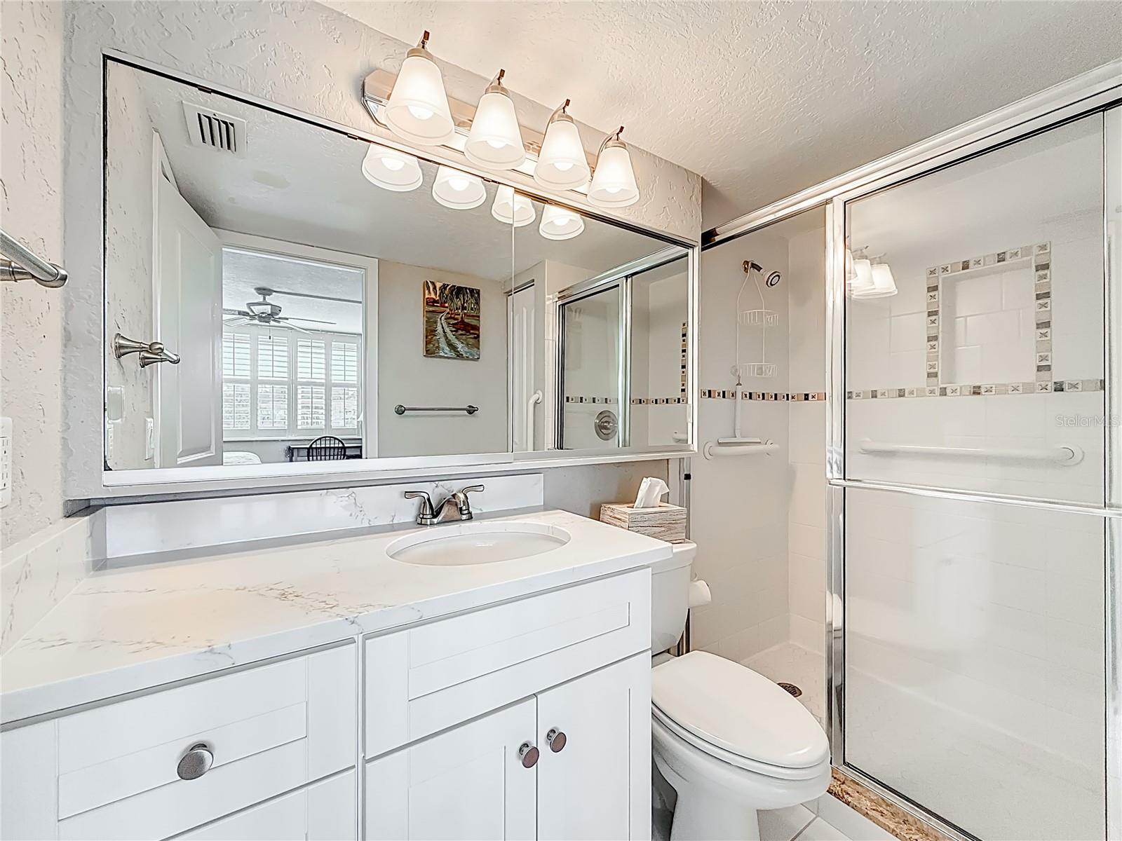 This is your primary bathroom with a shower.