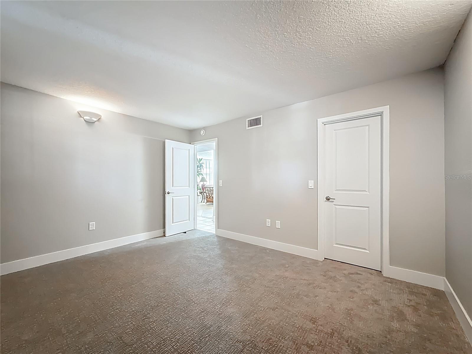 There is a walk-in closet in the 2nd bedroom.  Notice the newer interior doors throughout the condo