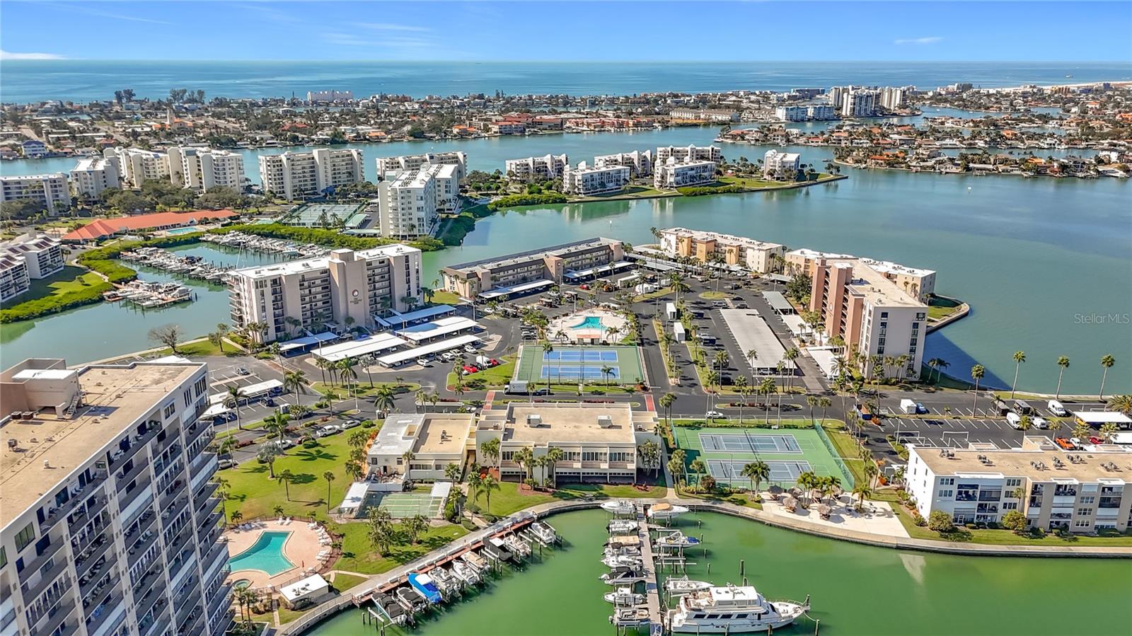 This aerial view shows some of the buildings located in Bay Island.  The Enterprise building is located to the far left.