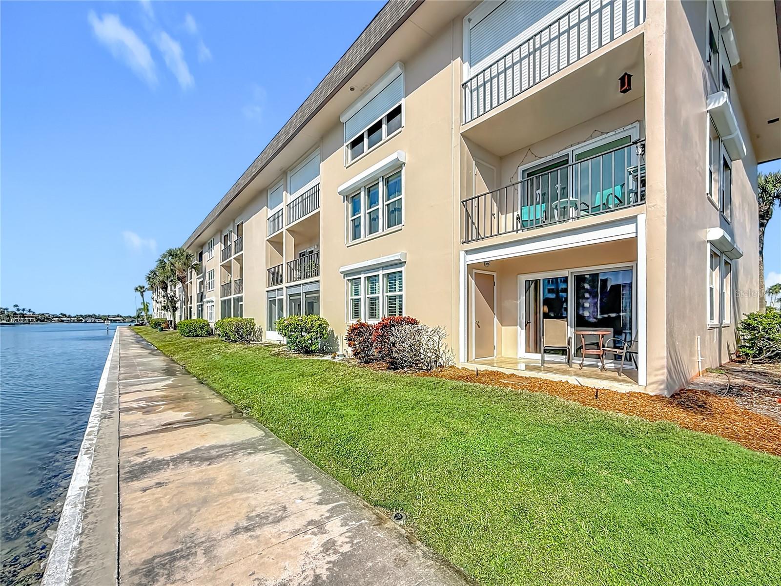 This picture is looking at your corner unit patio and the walkway.