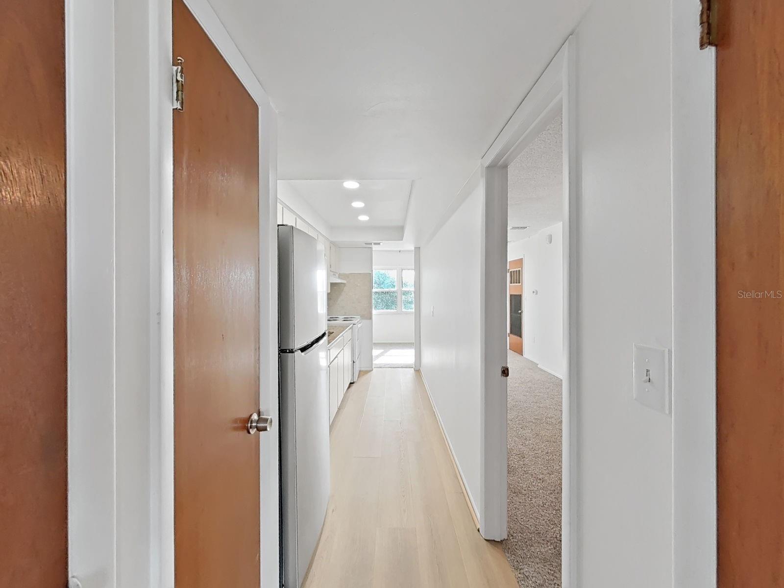 Galley kitchen straight ahead - bedroom on the right!