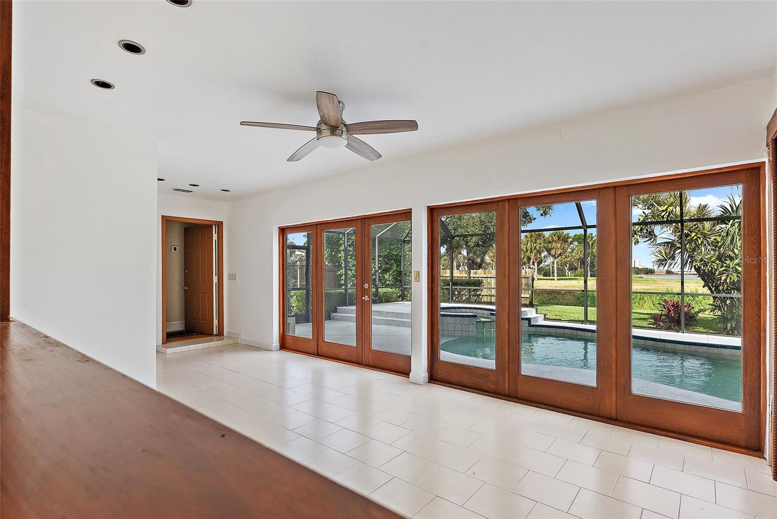 French Doors off Family toom to Caged in Pool/Spa