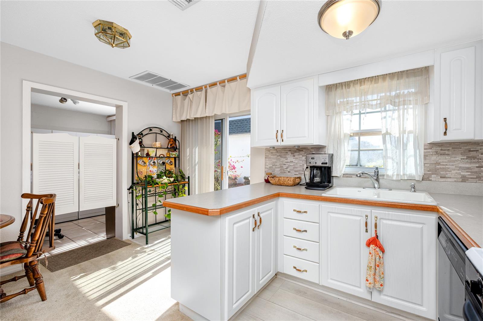 Kitchen with updated stone backsplash!