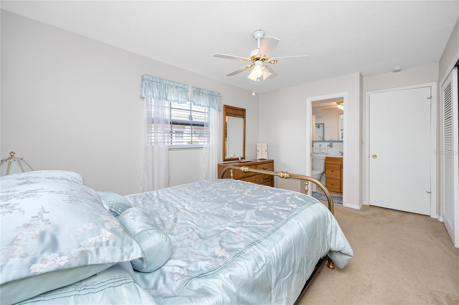 Primary Bedroom #1 with en-suite bathroom.