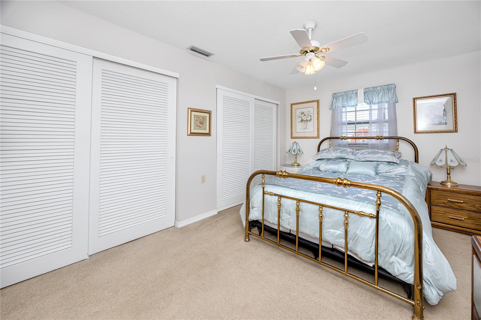 Primary Bedroom #1 with dual closets.