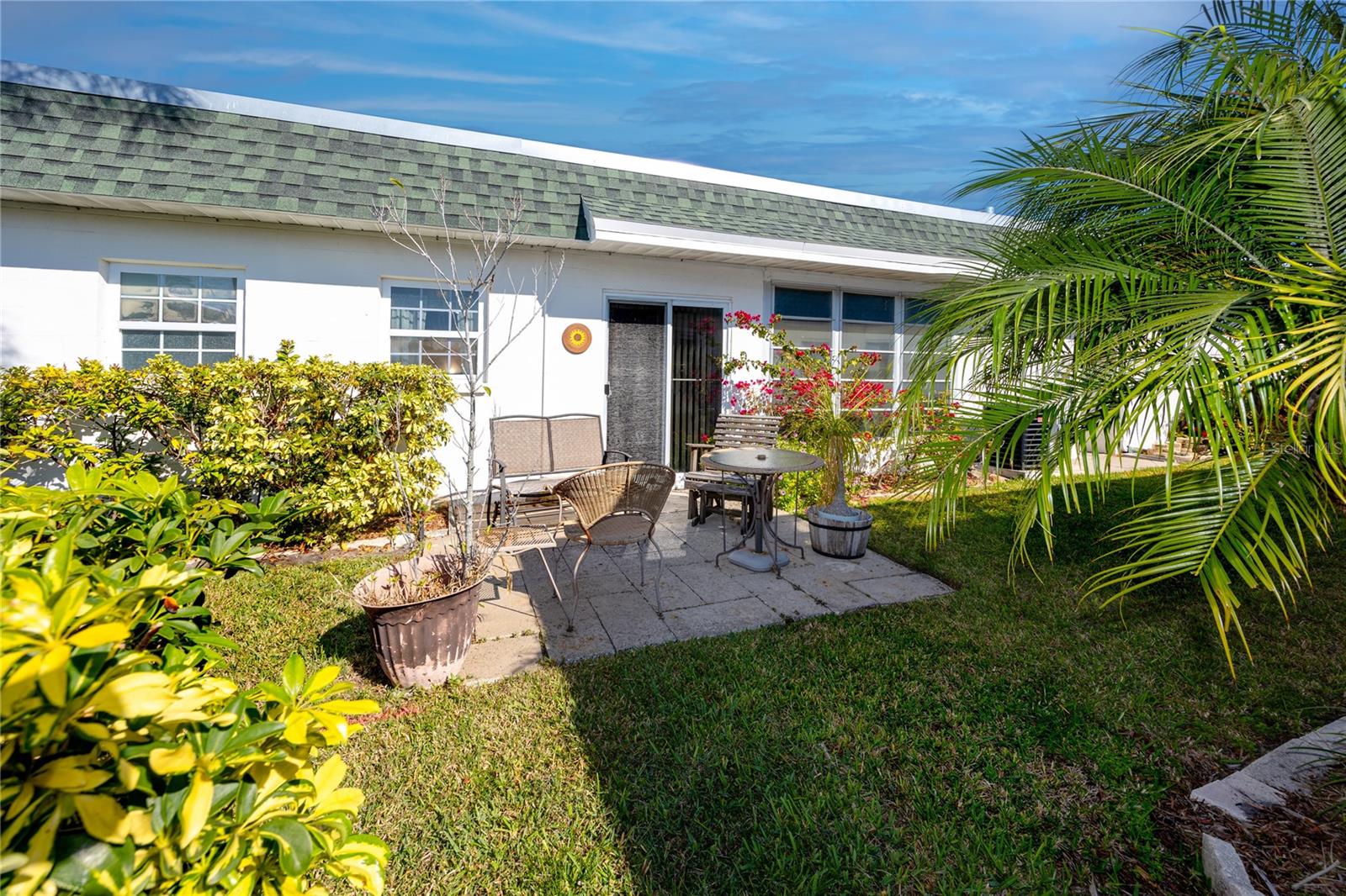 Pretty back patio with pool view!