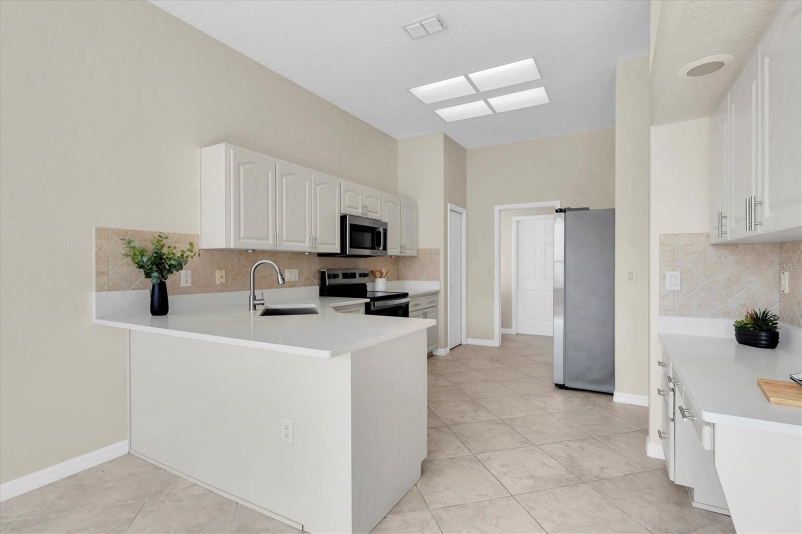 Kitchen and Breakfast Bar for extra seating