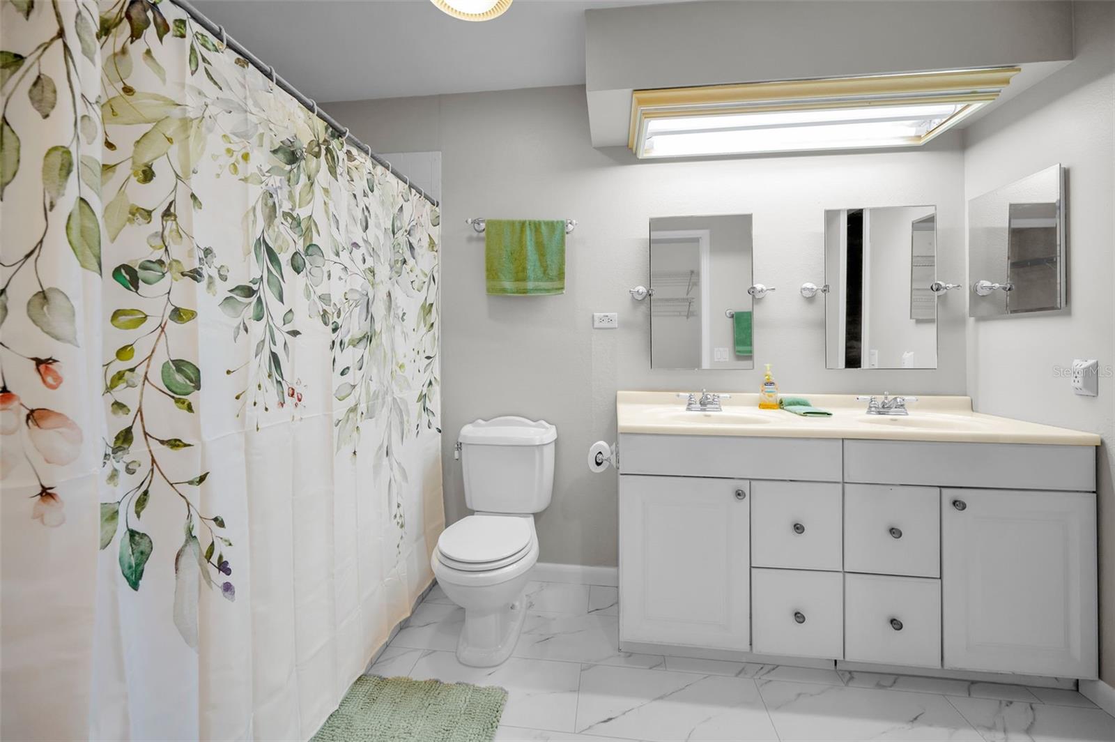 Primary bedroom ensuite with, walk in shower.