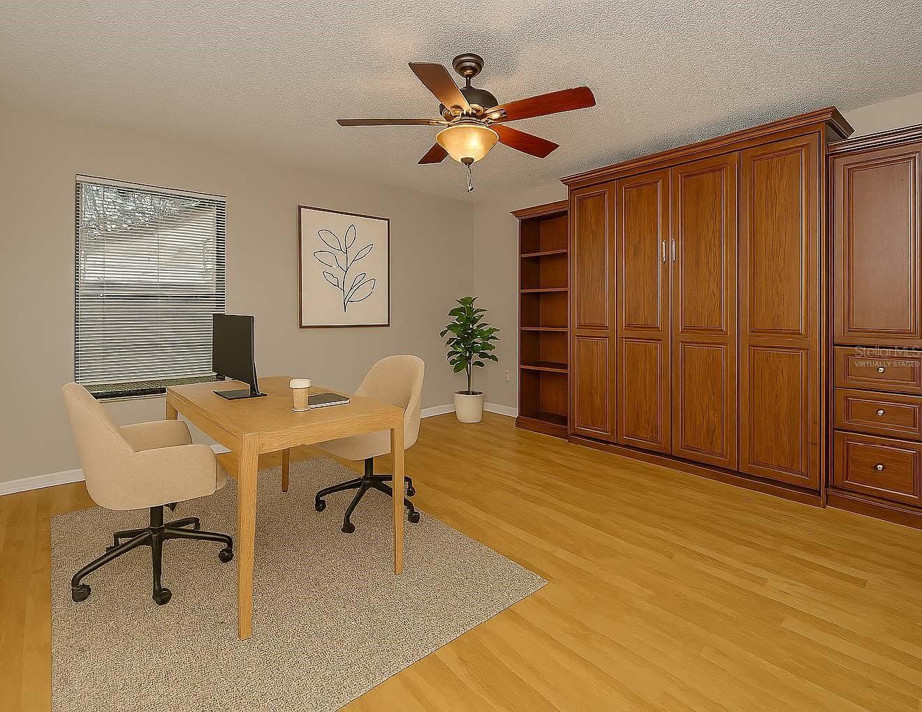 Third bedroom, office space virtually staged.