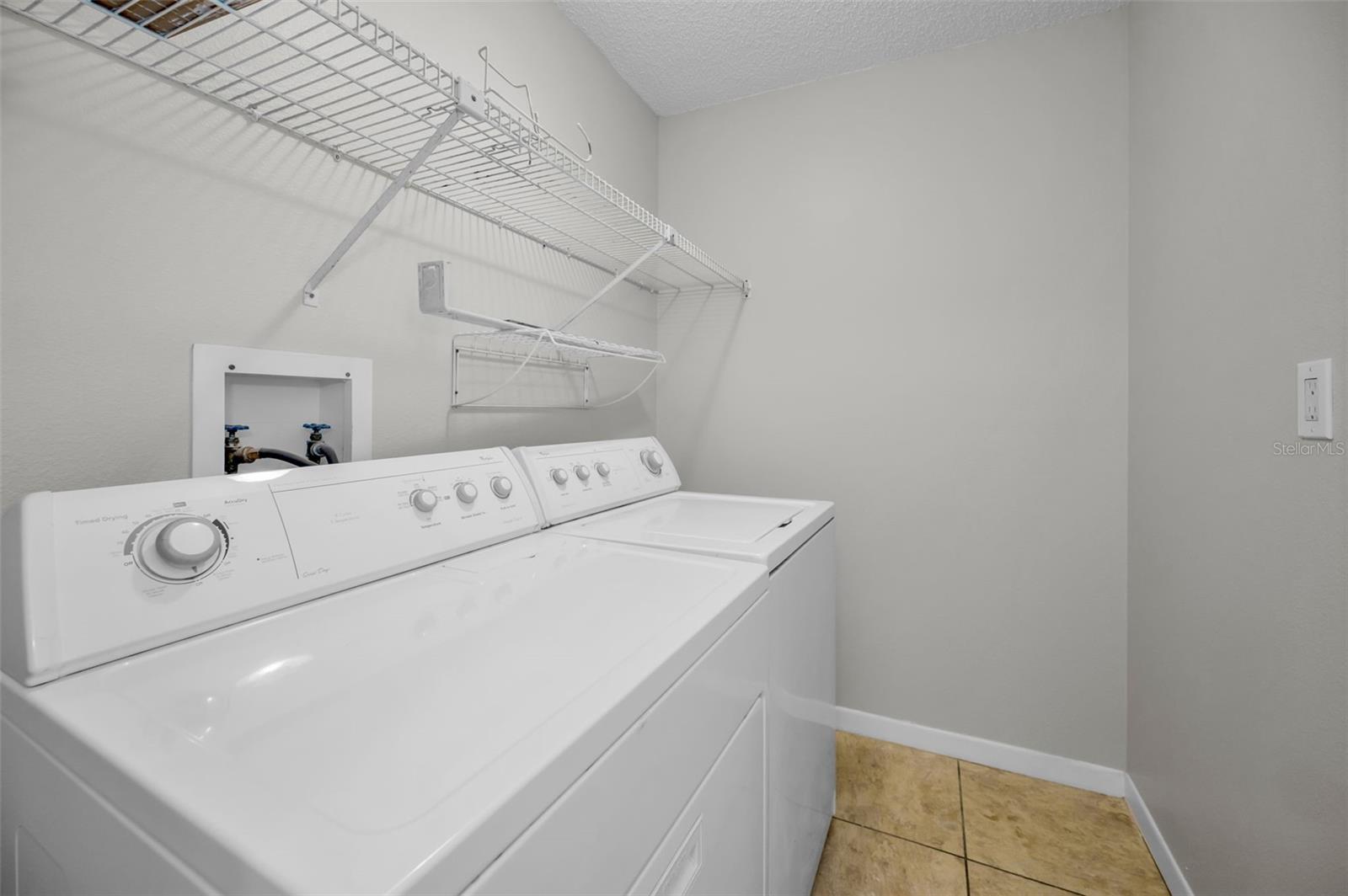 Inside laundry room.