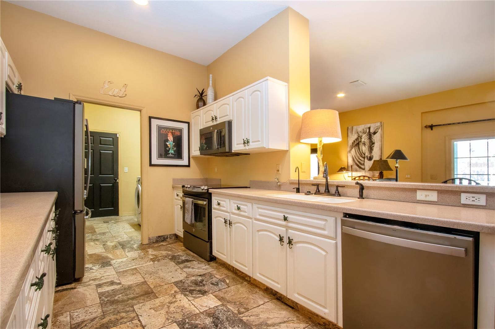 Tons of counter and cabinet space on both sides