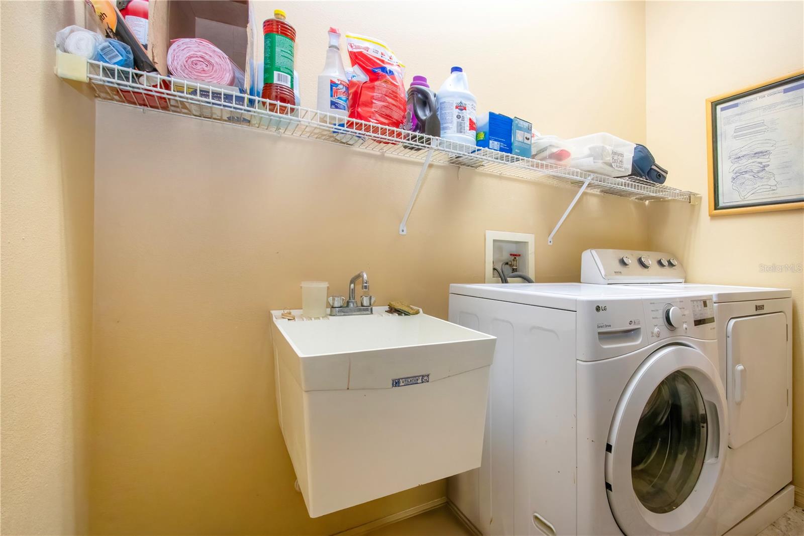 The laundry room also has a utility sink