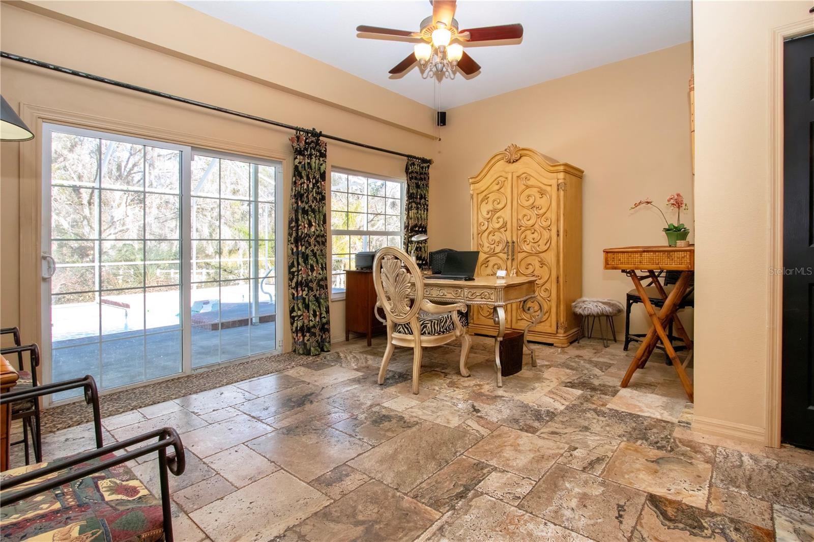 view of the pool and office