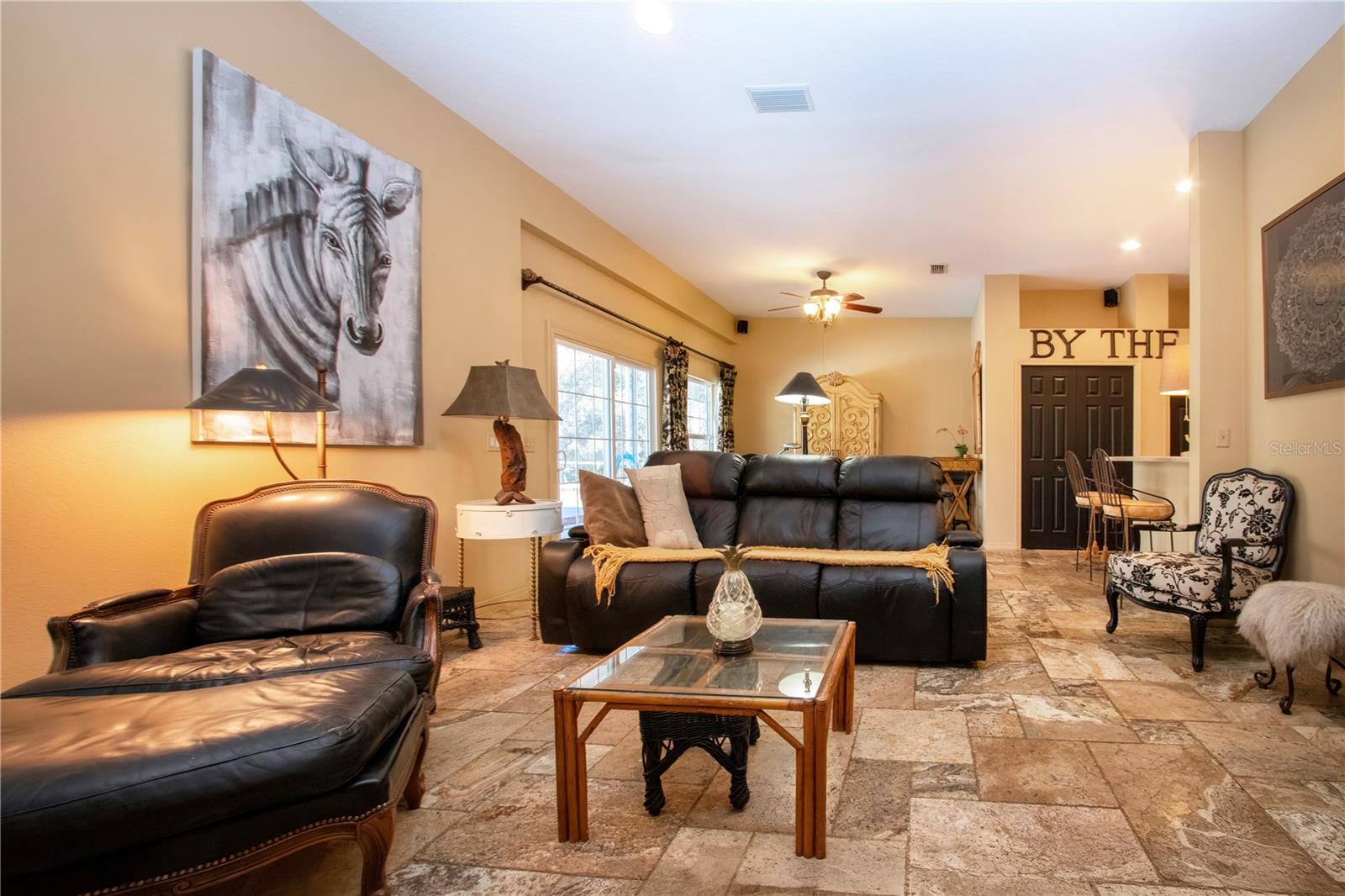 View of great room from the hall leading to the 2nd bedroom