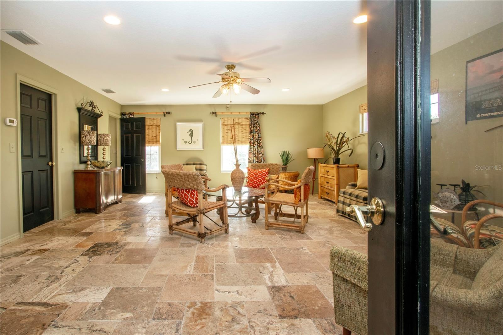 2nd floor living space leads to enclosed porch