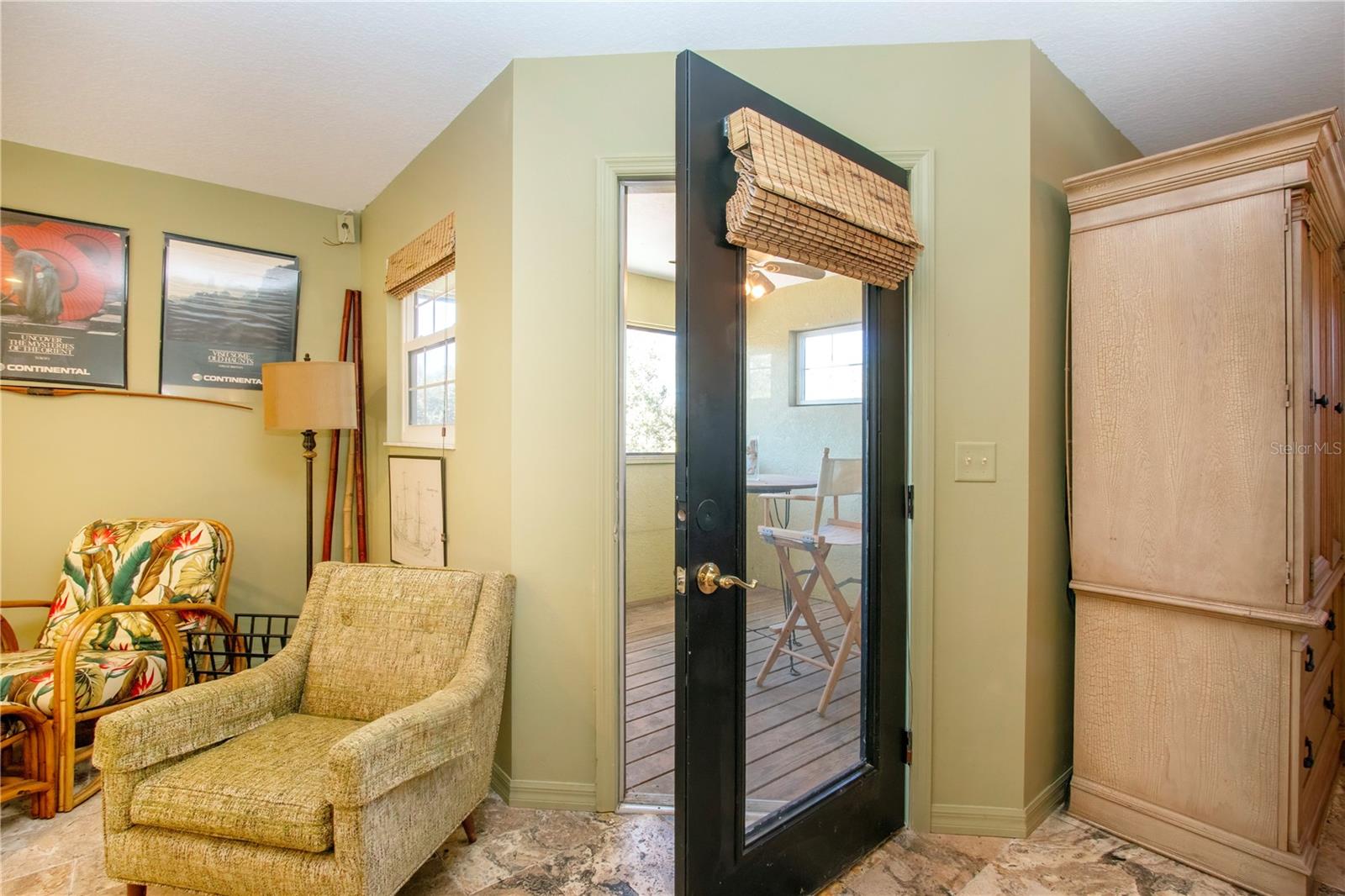 2nd floor living space leads to enclosed porch