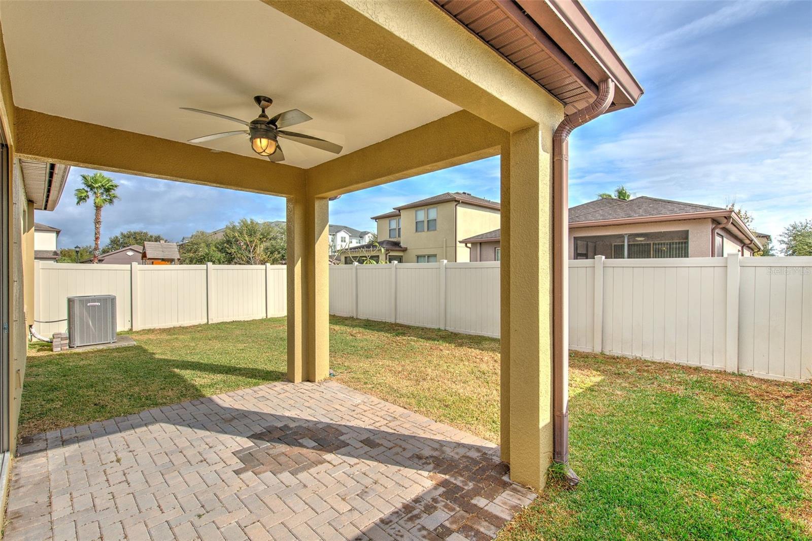 Covered Lanai with pavers and ceiling fan