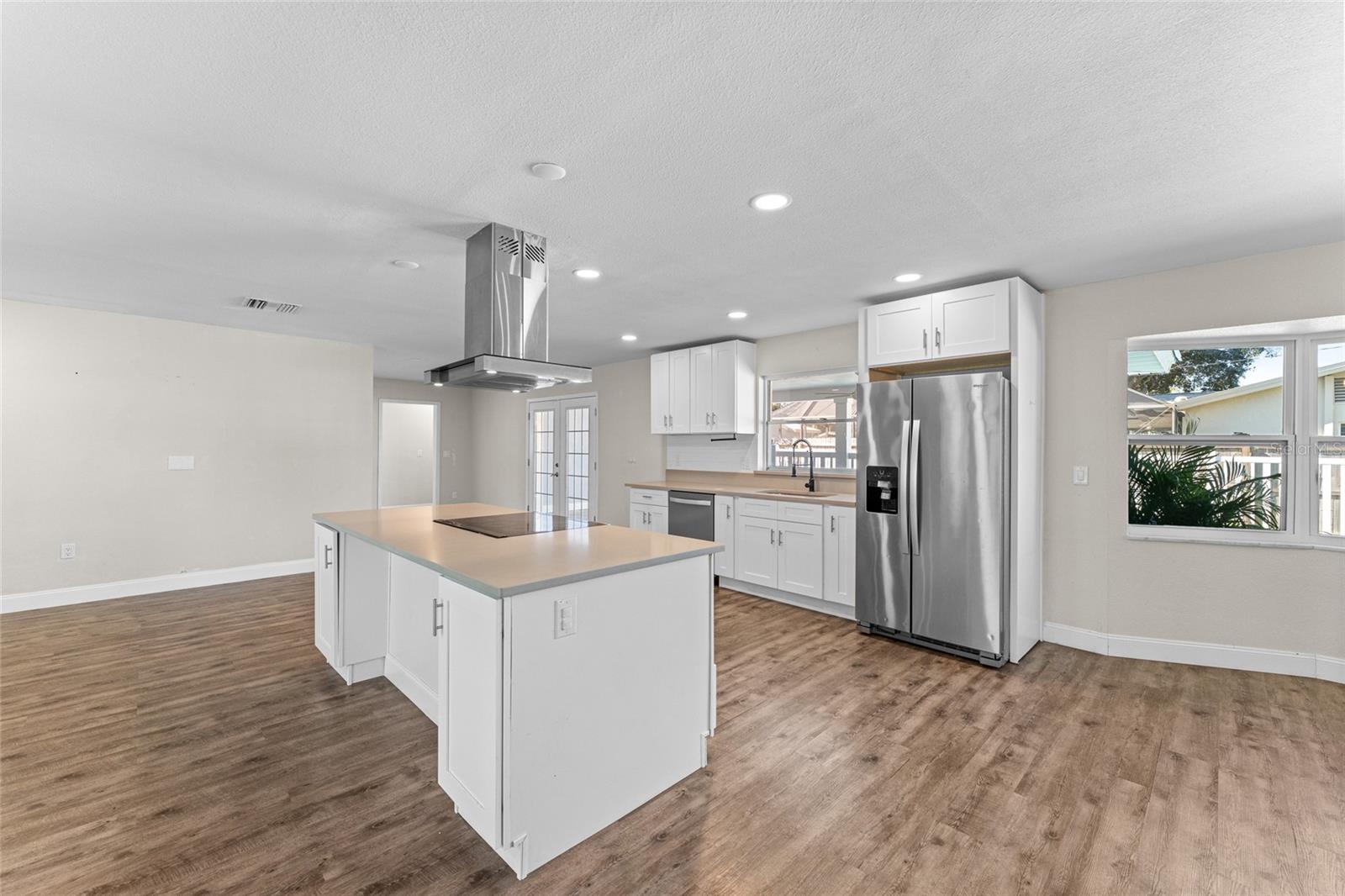 Spacious updated kitchen with stainless steel appliances