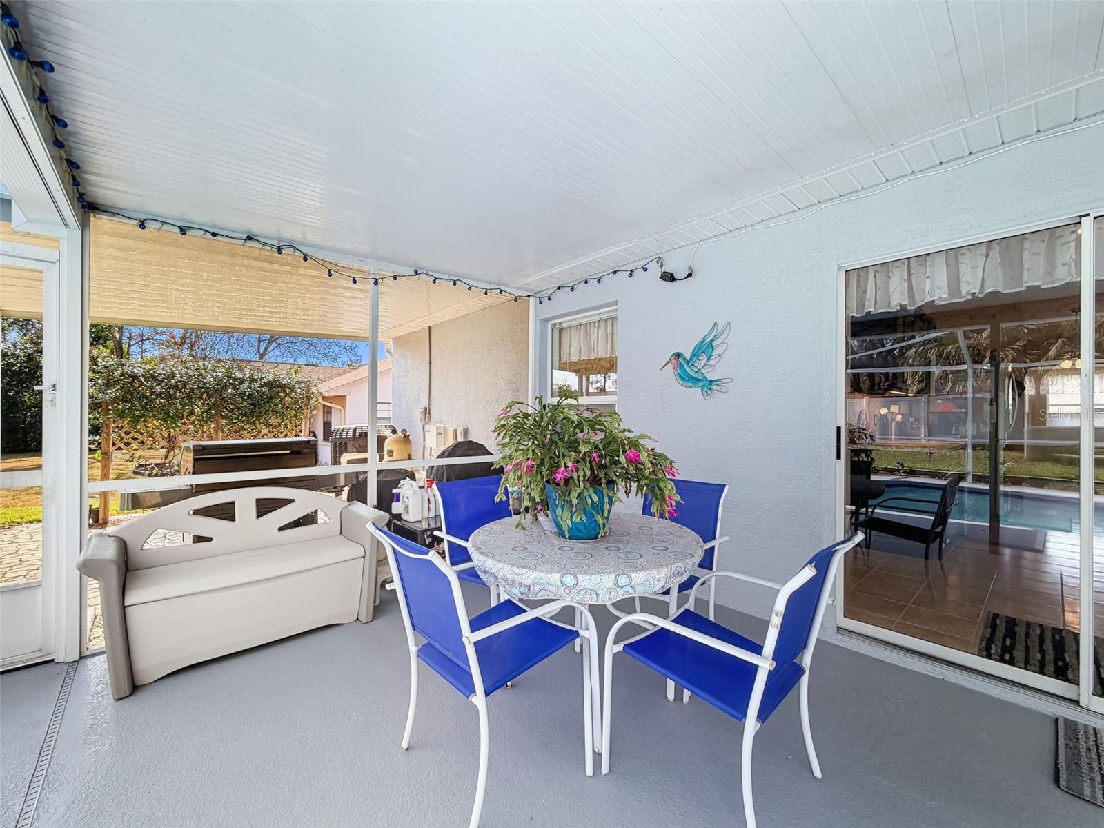 Go through the sliders from Family Room out to Lanai for your morning coffee