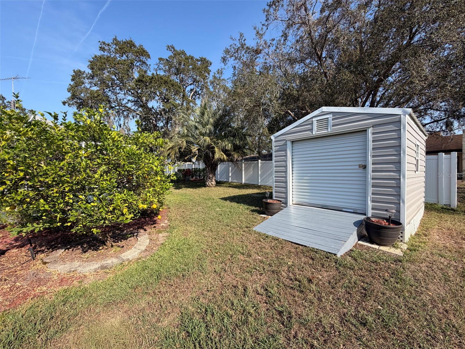 Hurricane rated shed with ramp for easy access with your mower