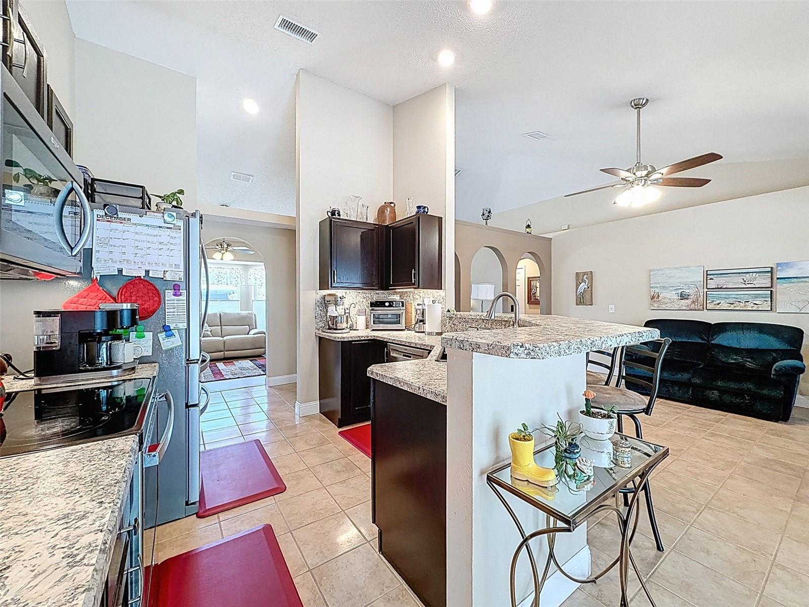 Spacious Kitchen opens to the Family Room & Dining Area - Great for entertaining!!