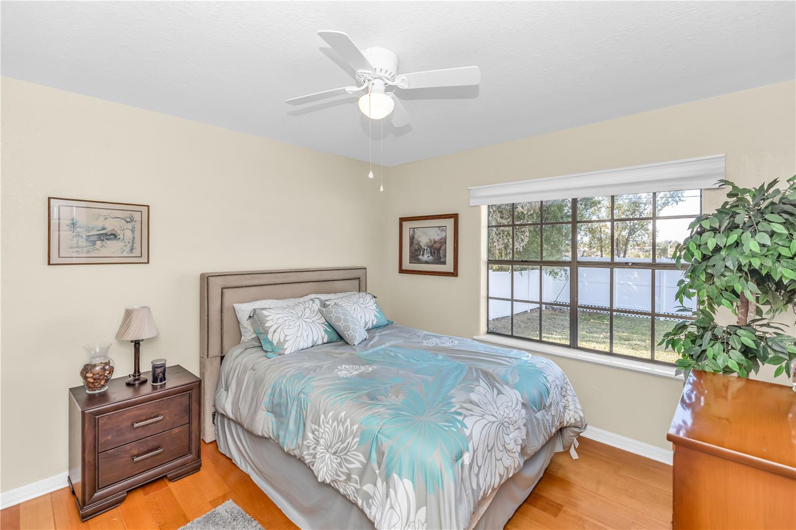 Bedroom 2 with backyard/pool view