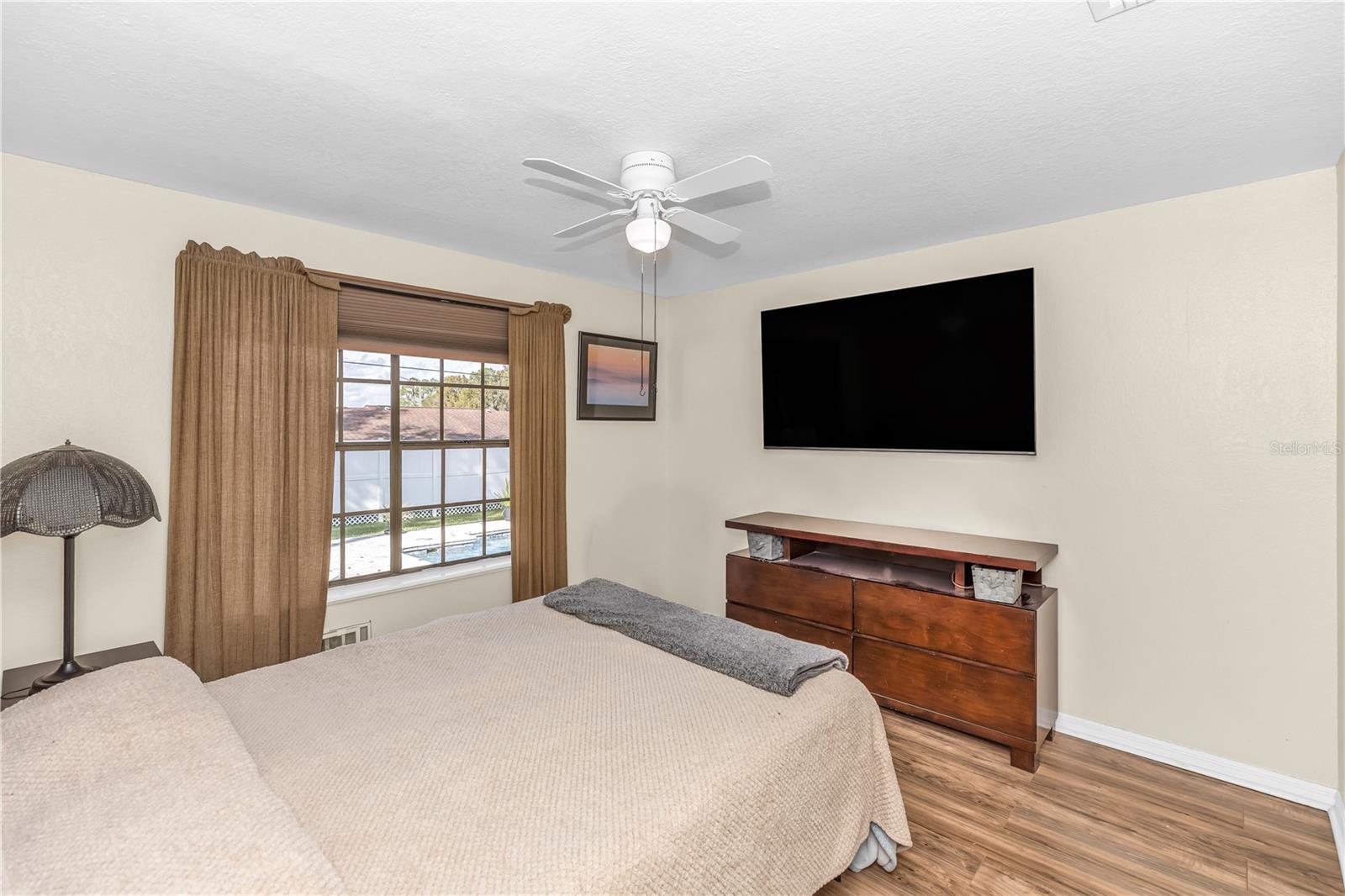 Bedroom 3 with Back yard/pool view