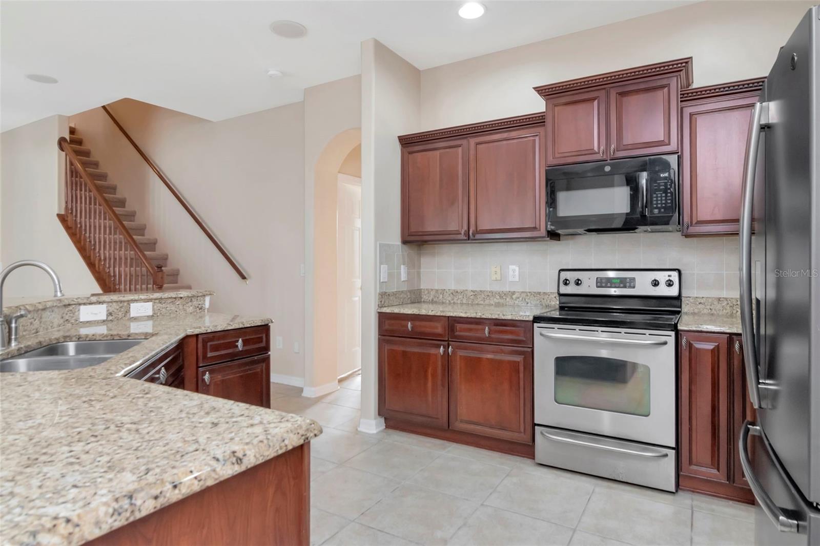 Stairwell leads to Bonus Room, Bedroom & Bath