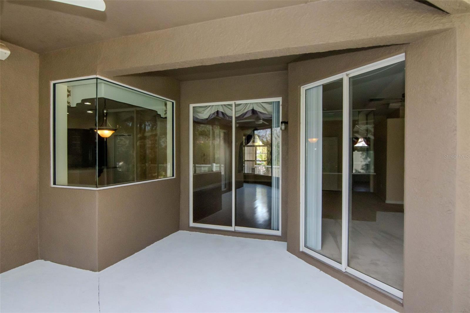 Covered Lanai Doors to Family Room & Kitchen