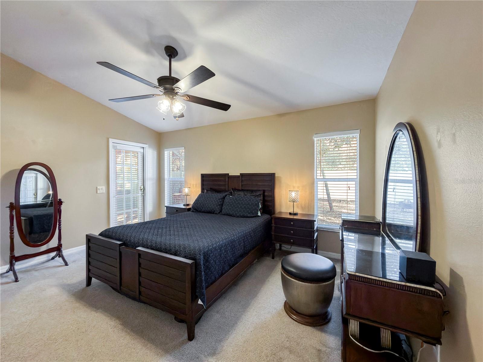 Primary suite has its own access to the serene screened-in lanai