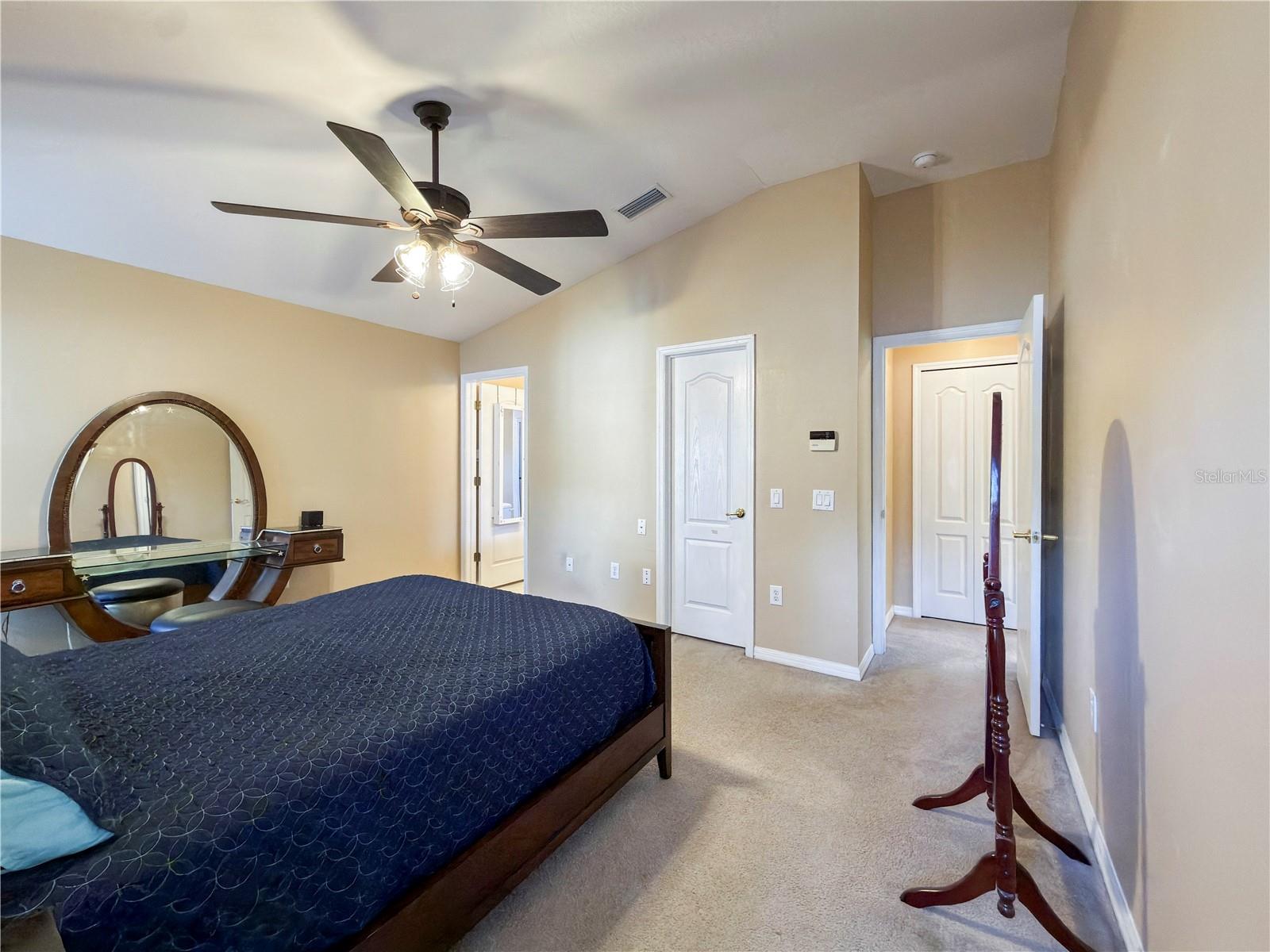 Huge walk-in closet across from the bed