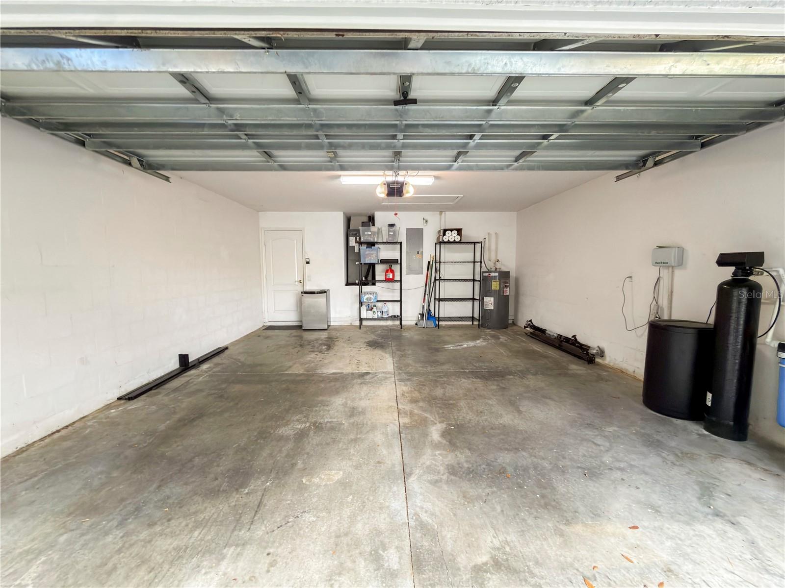 Two car garage with AC 2021 and water heater 2023, water softener and home filtration