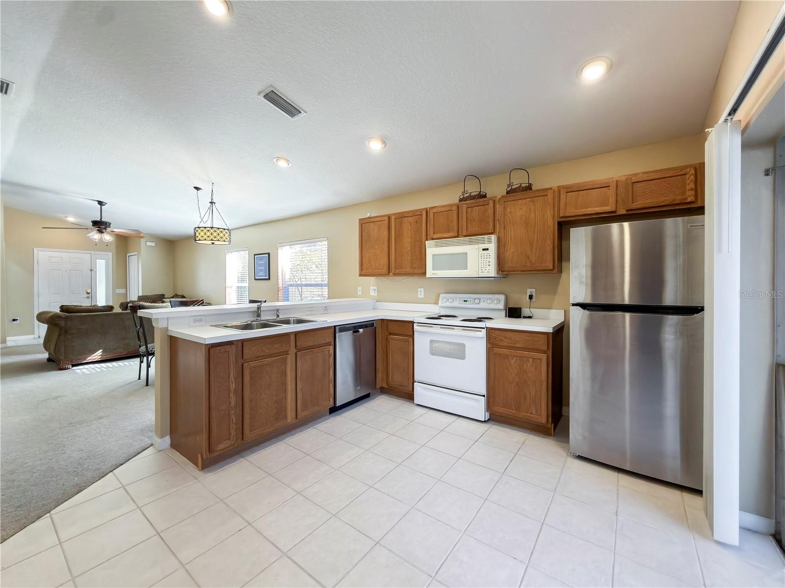 Spacious kitchen with almost new appliances. New stainless range and microwave coming soon!