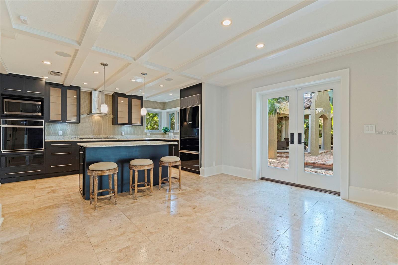 Open to the dining area and flows to the pool patio.