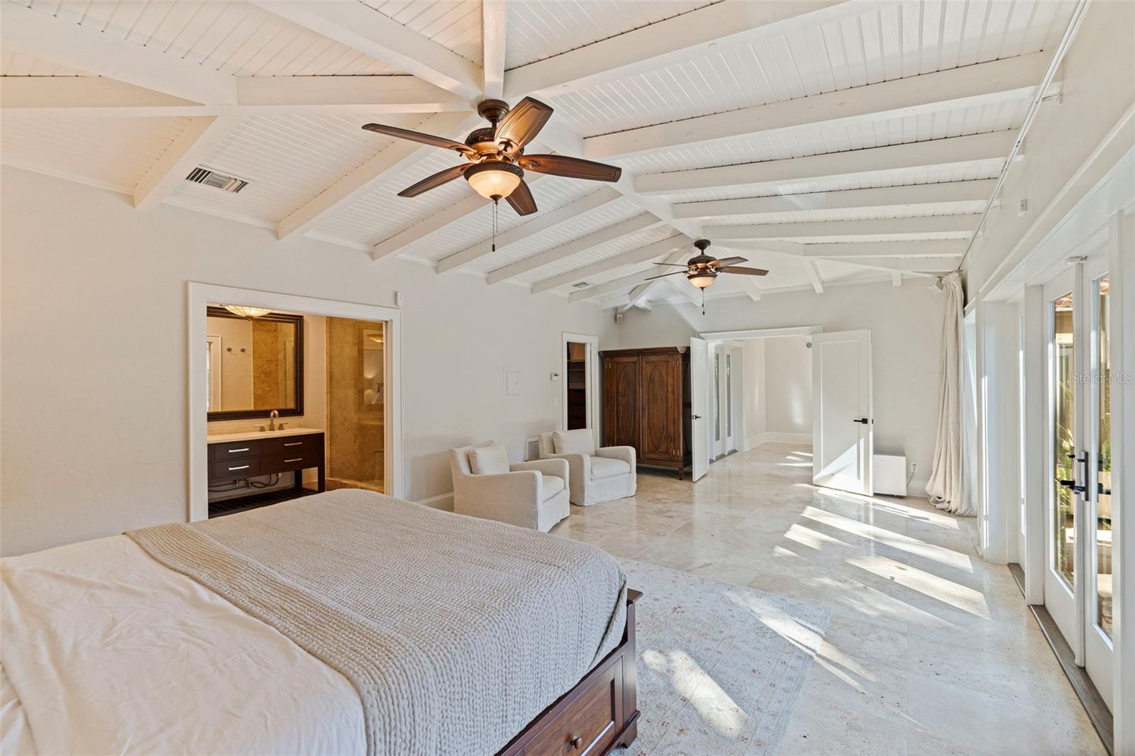 Vaulted ceilings and exposed wood beams.