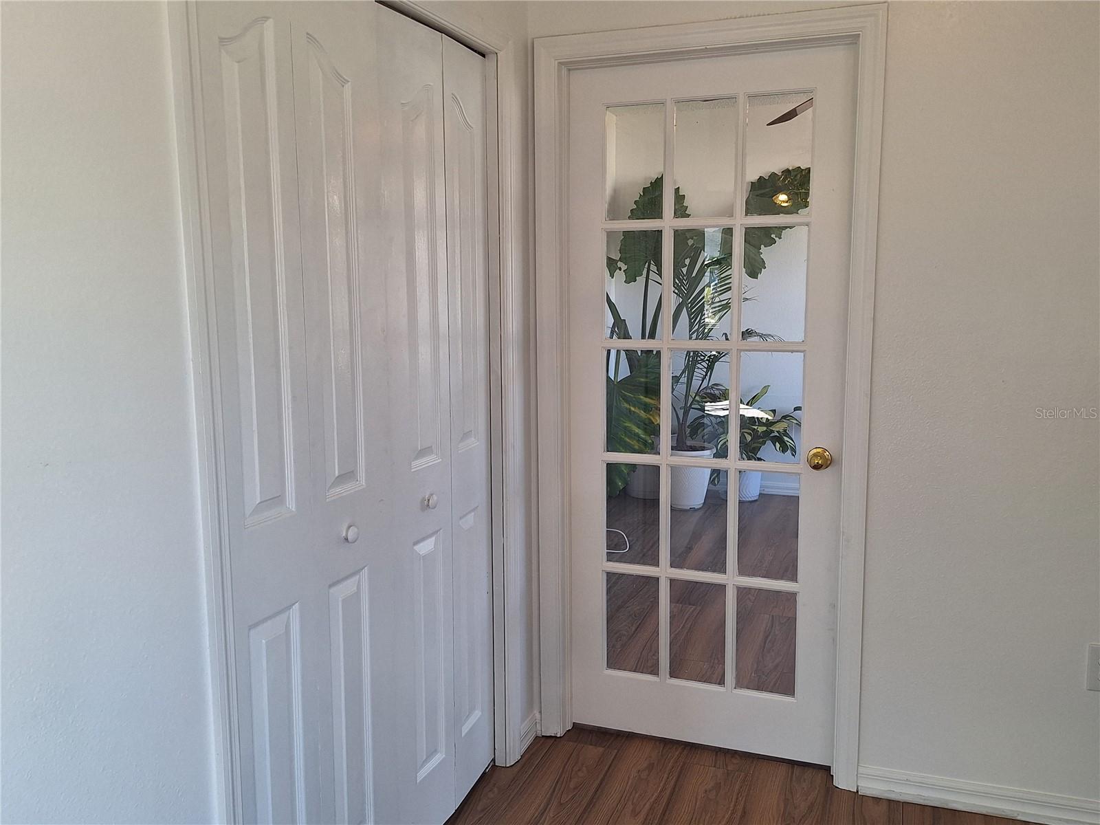 French door to Den. Closet just beside the Den