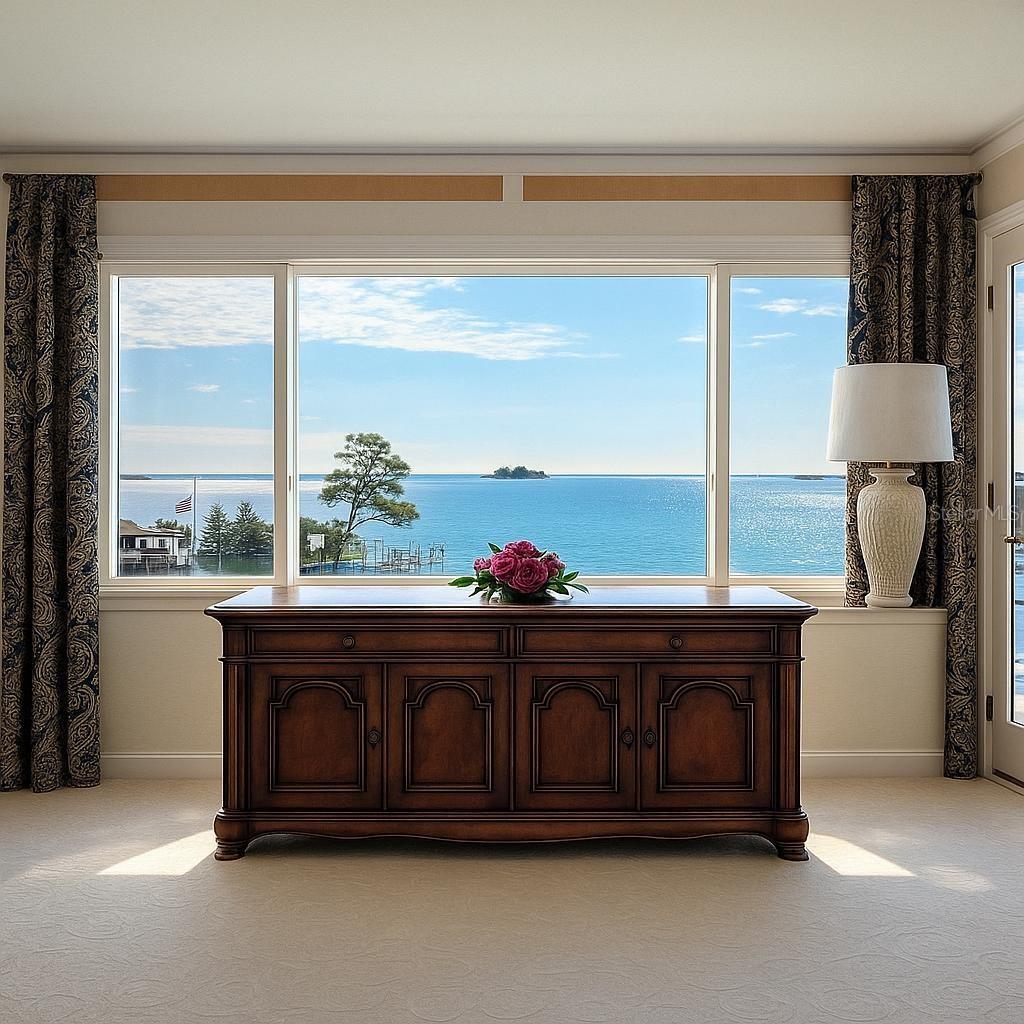 Your master suite offers a lavish sanctuary framed by shimmering, resort-style waterfront vistas