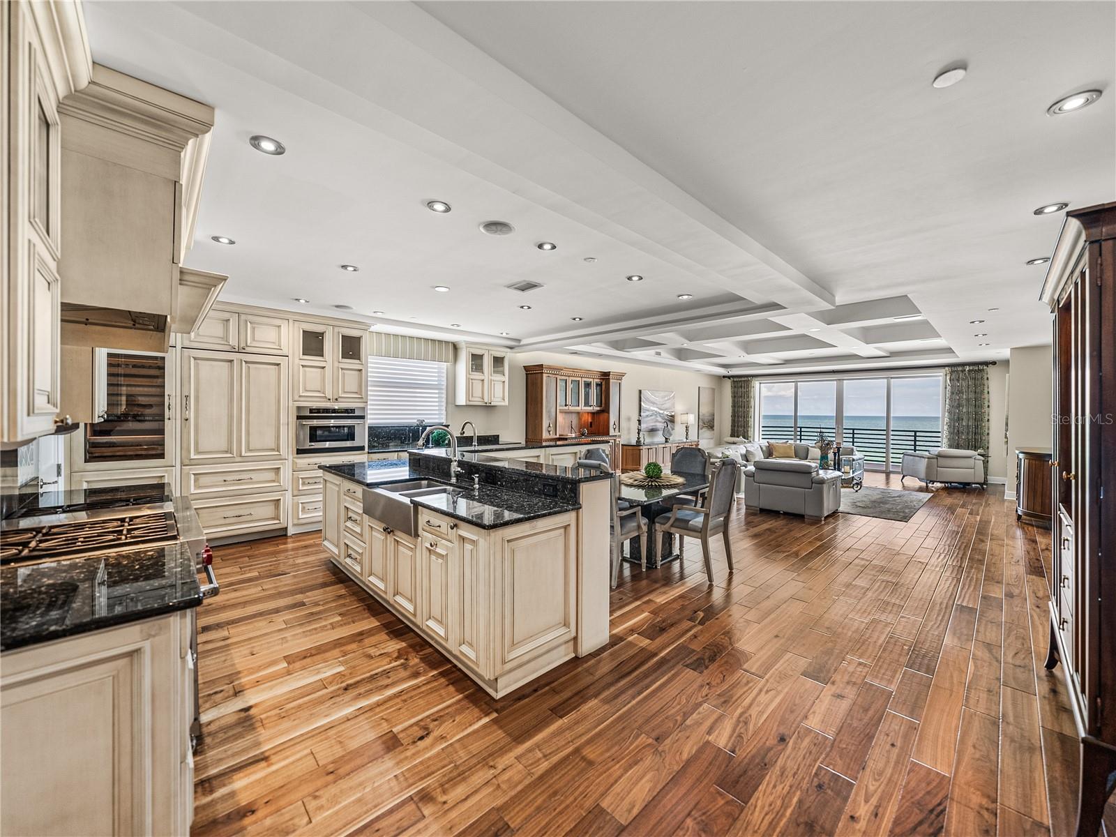 The kitchen and main living area is light and airy, enjoying natural light and beach views.
