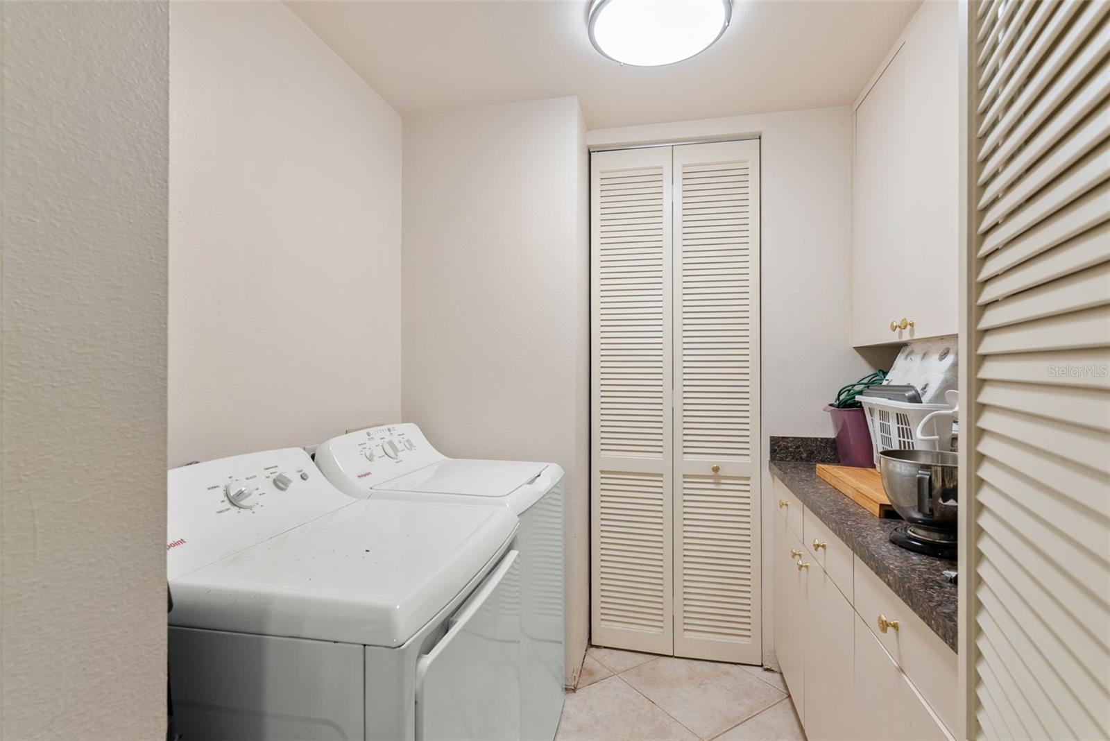 Laundry room off kitchen.