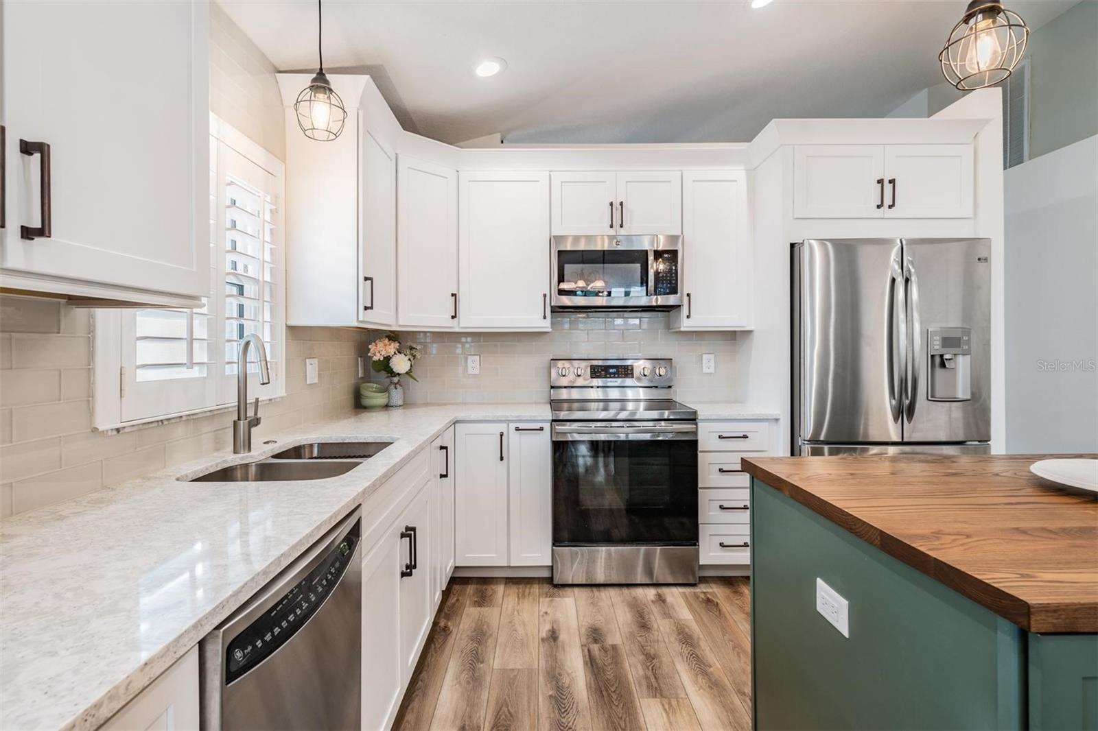 Stone countertops and all stainless appliances