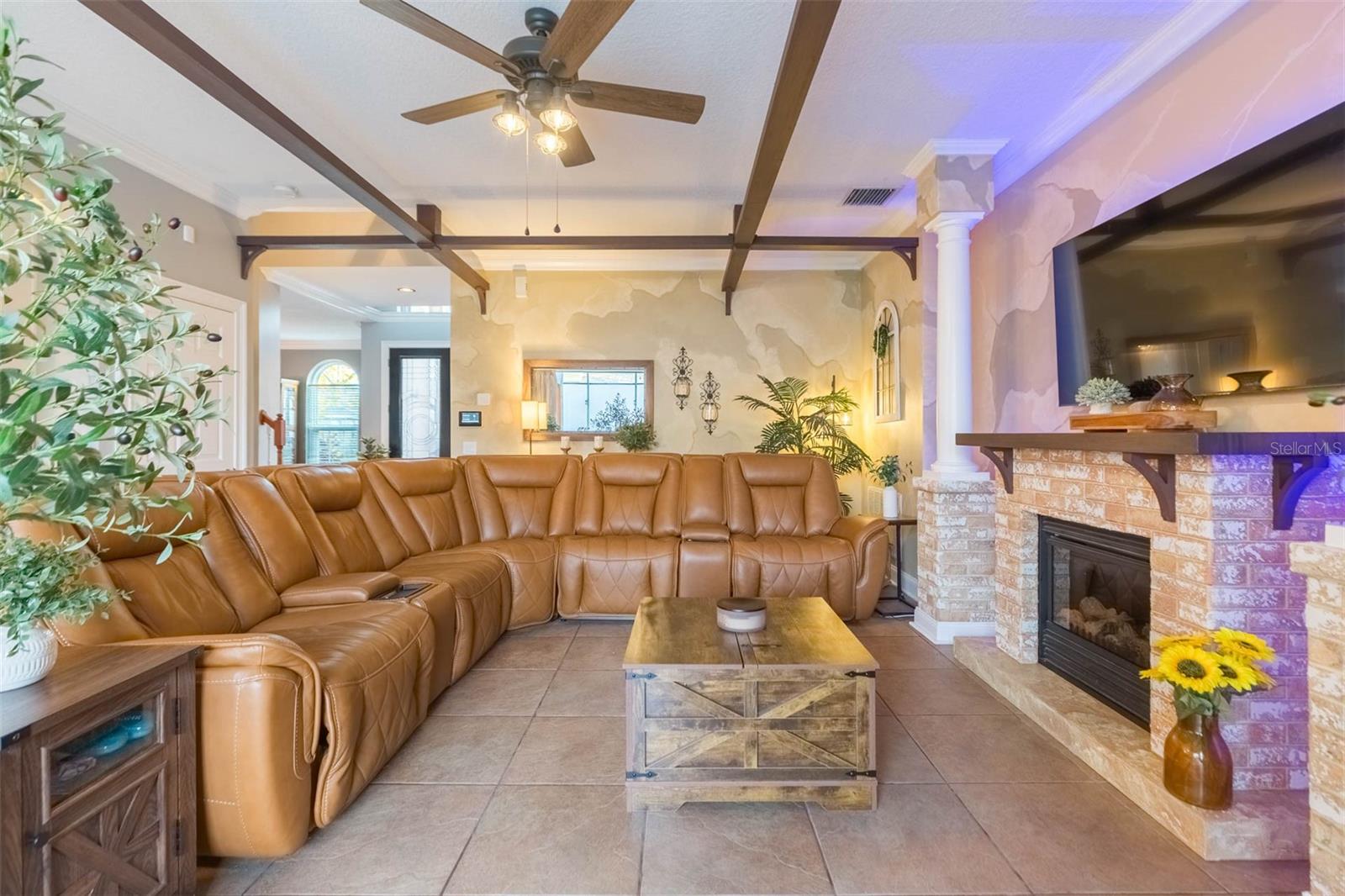 Huge space over the fireplace for the largest of TVs