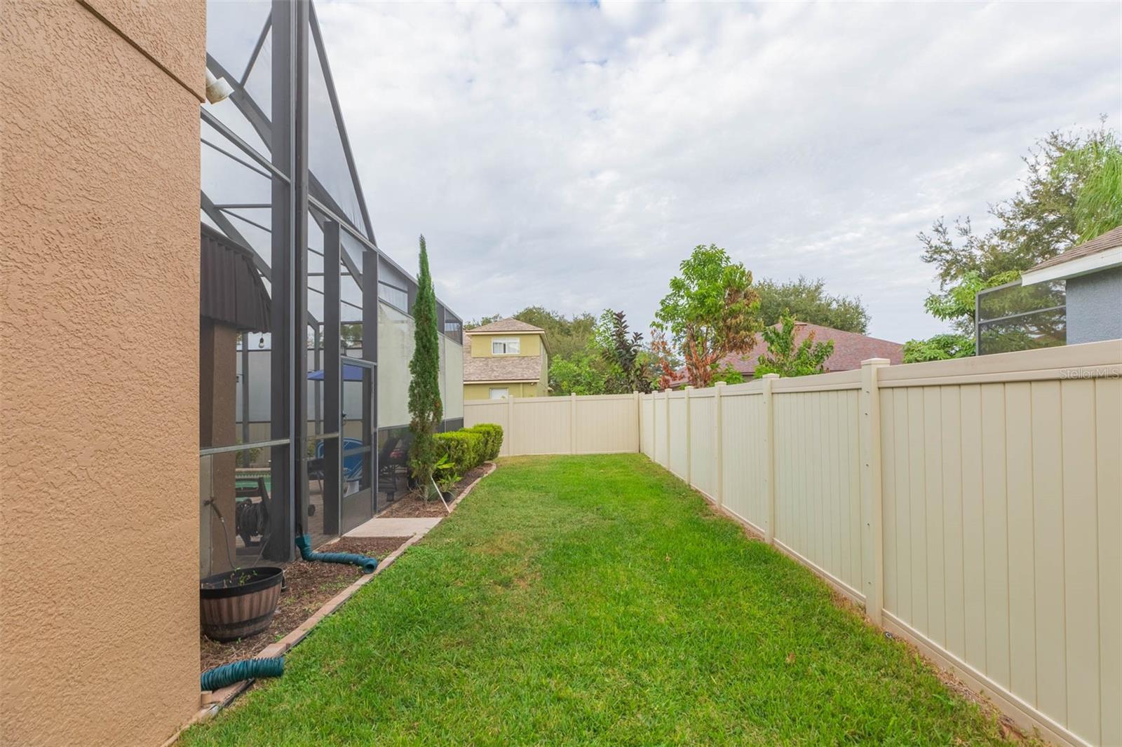 Side yard for furry family members or swingsets etc.