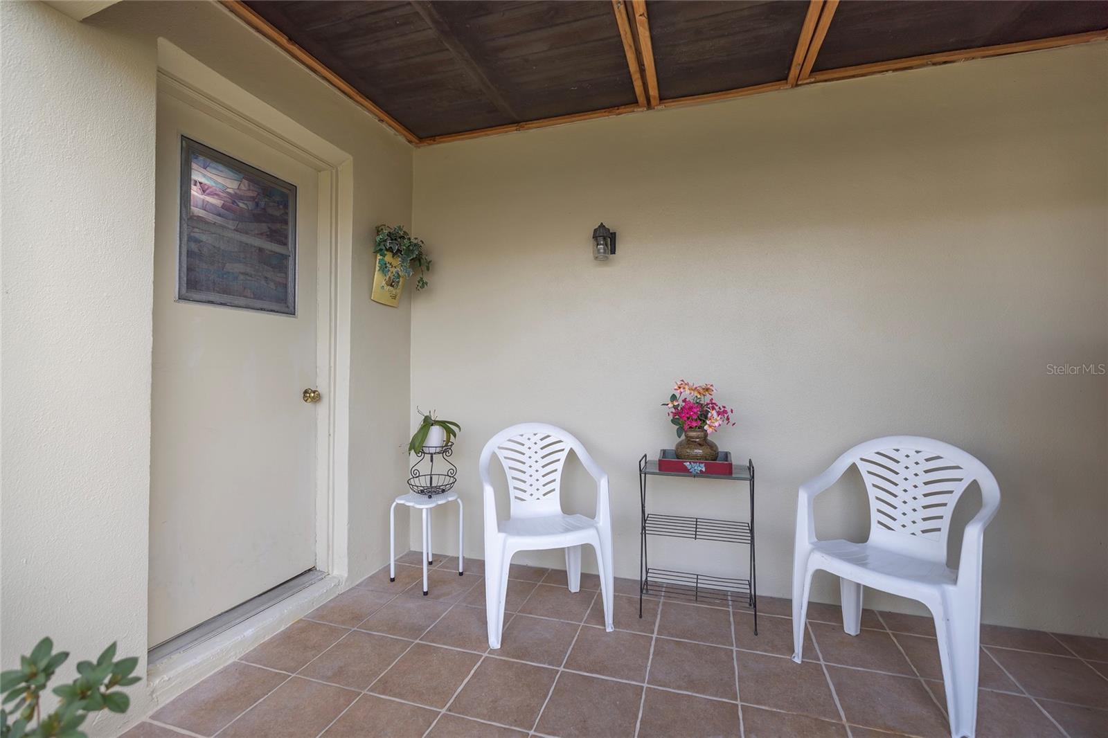 Exterior Lanai with back door to garage