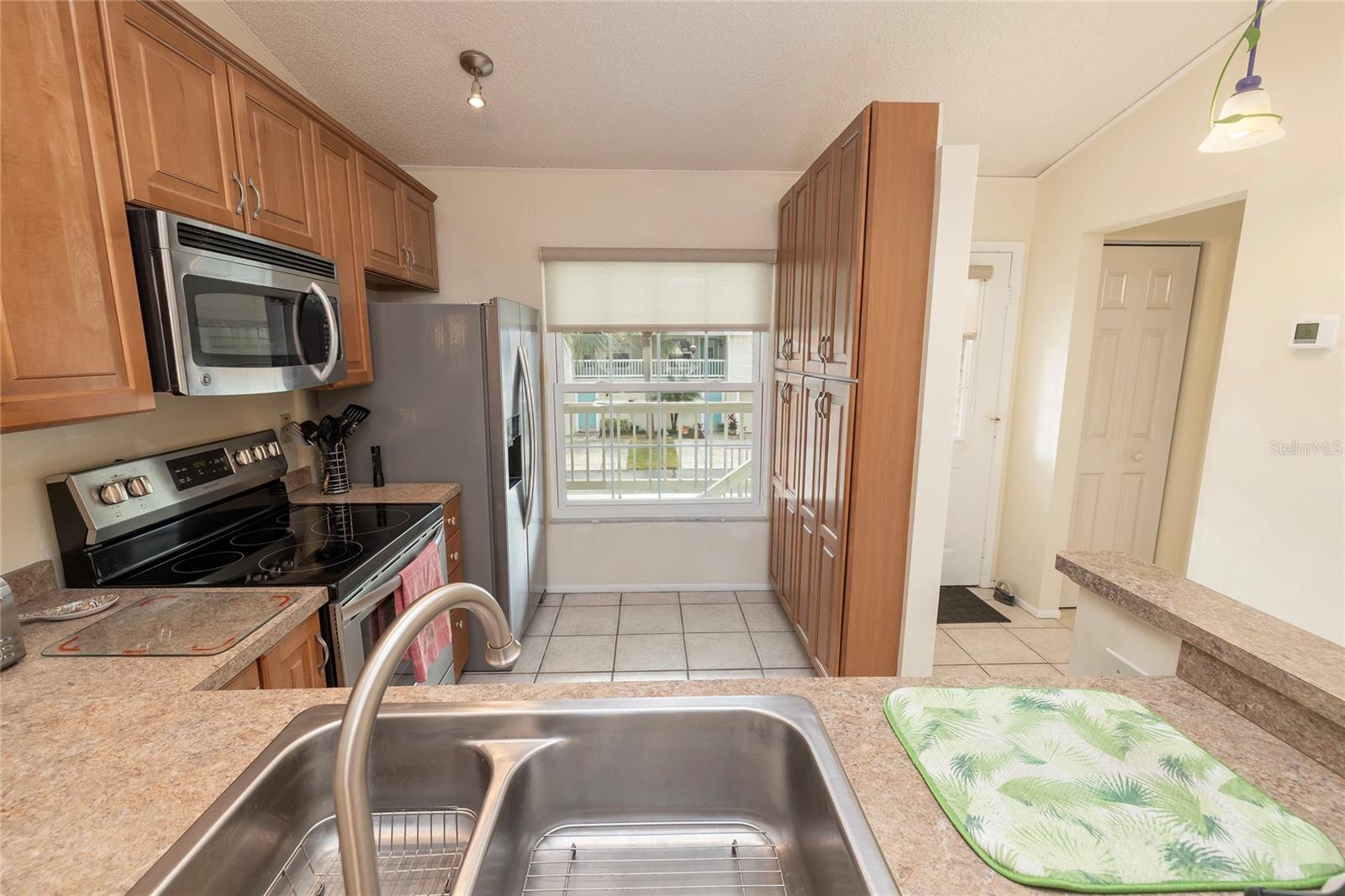 Stainless Steel appliances and custom cabinetry