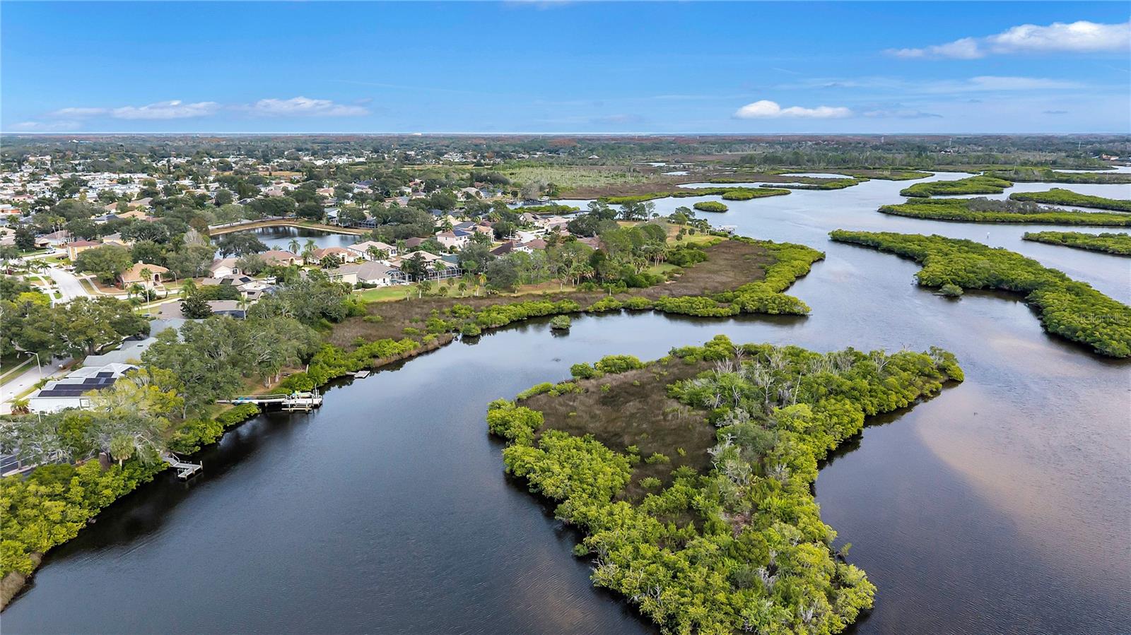 Fun Facts: The Anclote River is a 30 mile-long river named by Spanish explorers who used a "kedge" anchoring system called "anclotes" to navigate it's channels. It flows from Pasco County through Tarpon Springs to the Gulf of Mexico and is a commercial and recreational waterway for various boats, including fishing and sponge boats. The river is an important habitat for wildlife, and its surrounding area features natural parks and is used for recreation like fishing and picnics.